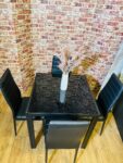 Black Dining Set with Glass Top – Elegant & Modern